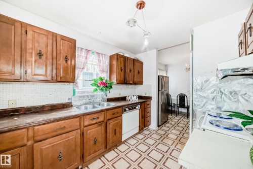 11239 97 Street, Edmonton, AB - Indoor Photo Showing Kitchen With Double Sink