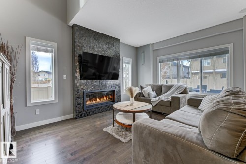 1251 Secord Landing, Edmonton, AB - Indoor Photo Showing Living Room With Fireplace