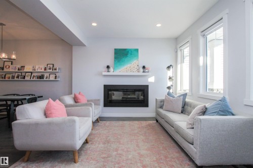 16752 15 Avenue, Edmonton, AB - Indoor Photo Showing Living Room With Fireplace