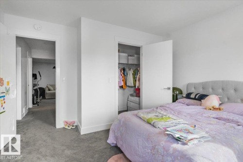 Bedroom with white walls and grey carpet flooring - 16624 32 Avenue, Edmonton, AB - Indoor Photo Showing Bedroom