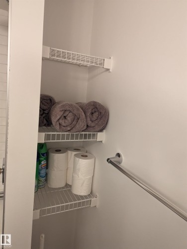 The property features a built-in closet with wire shelving for storage - 16624 32 Avenue, Edmonton, AB - Indoor With Storage