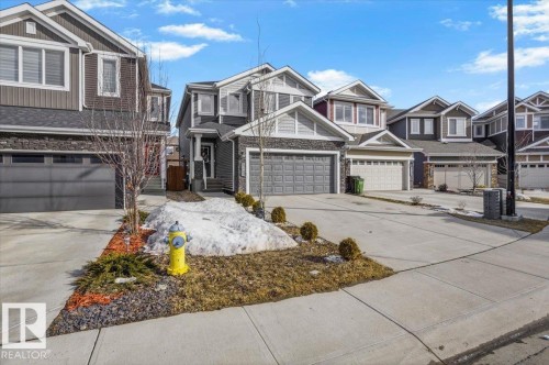 The property features a two-story design with a prominent front-facing garage - 16624 32 Avenue, Edmonton, AB - Outdoor With Facade