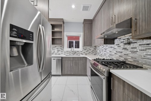 4112 8 Street, Edmonton, AB - Indoor Photo Showing Kitchen With Upgraded Kitchen