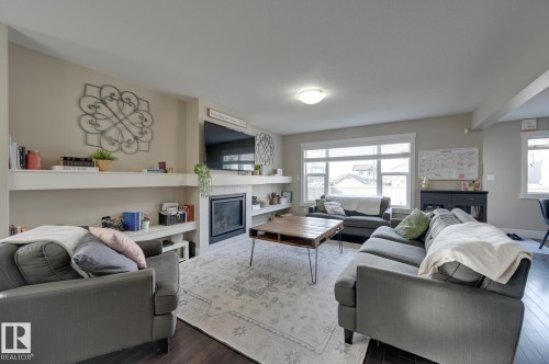 1564 36 Avenue, Edmonton, AB - Indoor Photo Showing Living Room With Fireplace