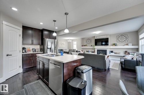 1564 36 Avenue, Edmonton, AB - Indoor Photo Showing Kitchen With Fireplace With Double Sink With Upgraded Kitchen