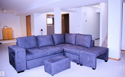 26 Simonette Crescent, Devon, AB - Indoor Photo Showing Living Room