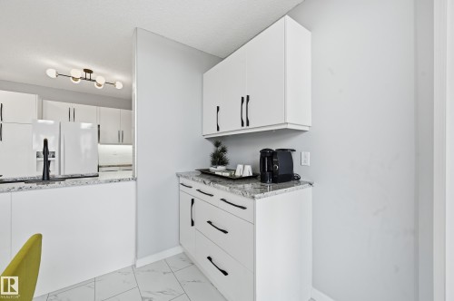 501 7905 96 Street, Edmonton, AB - Indoor Photo Showing Living Room With Fireplace