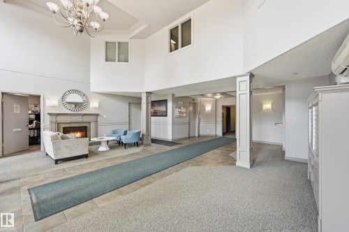 501 7905 96 Street, Edmonton, AB - Indoor Photo Showing Other Room With Fireplace