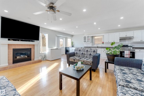 3139 34B Avenue, Edmonton, AB - Indoor Photo Showing Living Room With Fireplace