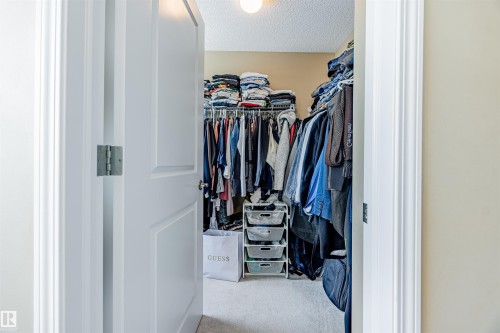 Spacious walk-in closet. - 1312 74 Street, Edmonton, AB - Indoor With Storage