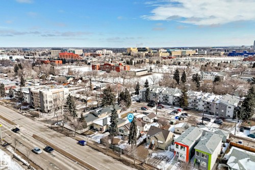 Aerial view of the neighborhood featuring a road, residential buildings, and trees - 10839 109 Street, Edmonton, AB - Outdoor With View