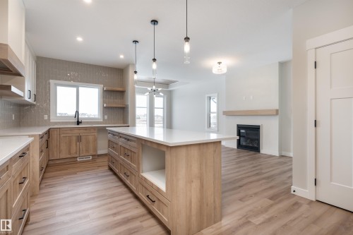 8 Tenuto Link, Spruce Grove, AB - Indoor Photo Showing Kitchen With Upgraded Kitchen