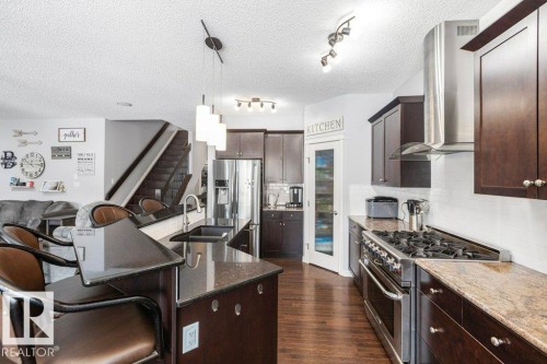 6105 17A Avenue, Edmonton, AB - Indoor Photo Showing Kitchen With Double Sink With Upgraded Kitchen