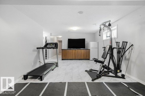 6105 17A Avenue, Edmonton, AB - Indoor Photo Showing Gym Room