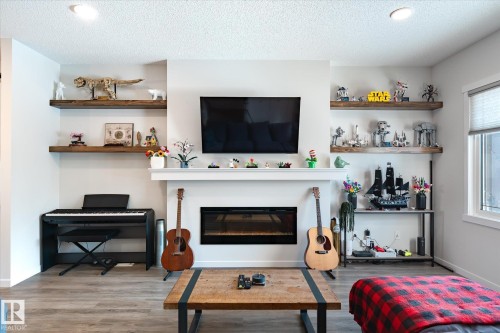 17487 77 Street, Edmonton, AB - Indoor Photo Showing Living Room With Fireplace