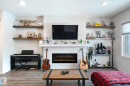 17487 77 Street, Edmonton, AB  - Indoor Photo Showing Living Room With Fireplace 