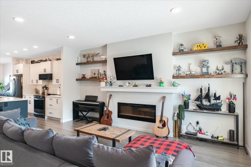 17487 77 Street, Edmonton, AB - Indoor Photo Showing Living Room With Fireplace