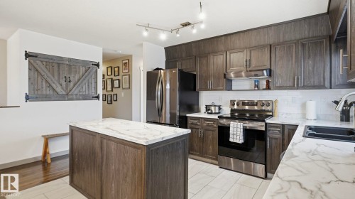 5107 57 Avenue, Stony Plain, AB - Indoor Photo Showing Kitchen With Double Sink With Upgraded Kitchen