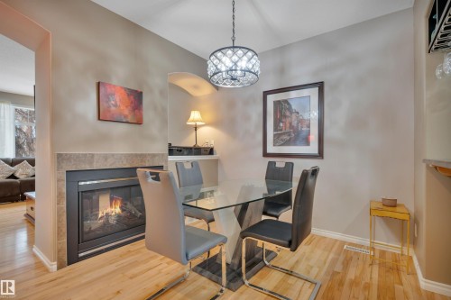 9555 73 Avenue, Edmonton, AB - Indoor Photo Showing Dining Room With Fireplace