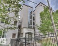 The property features a multi-story exterior with a light-colored facade, numerous windows, and multiple balconies - 415 10503 98 Avenue, Edmonton, AB  - Outdoor 