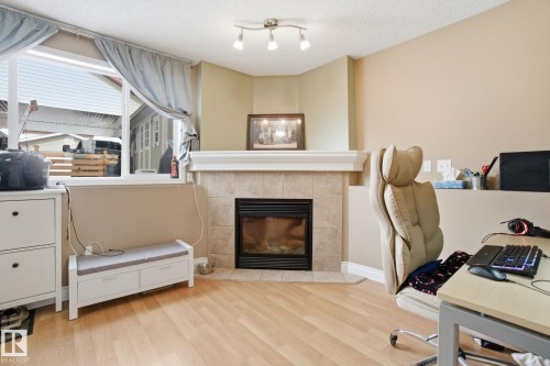 14048 151 Avenue, Edmonton, AB - Indoor Photo Showing Living Room With Fireplace