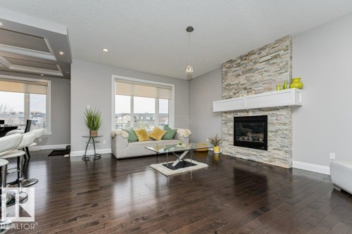 610 Albany Way, Edmonton, AB - Indoor Photo Showing Living Room With Fireplace