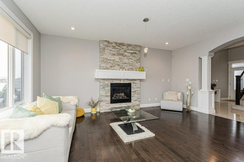 610 Albany Way, Edmonton, AB - Indoor Photo Showing Living Room With Fireplace