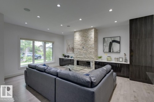 11045 85 Avenue, Edmonton, AB - Indoor Photo Showing Living Room With Fireplace
