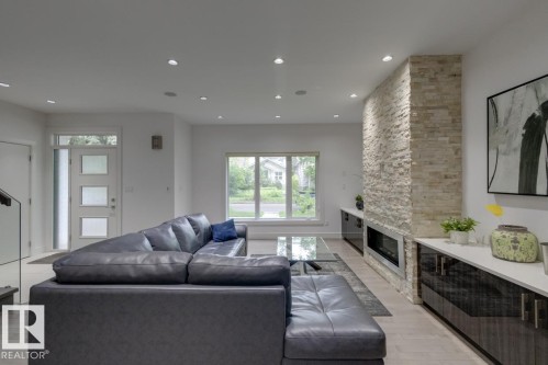 11045 85 Avenue, Edmonton, AB - Indoor Photo Showing Living Room With Fireplace