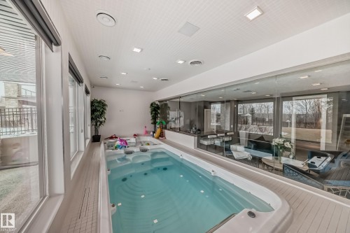 4129 Cameron Heights Point, Edmonton, AB - Indoor Photo Showing Other Room With In Ground Pool