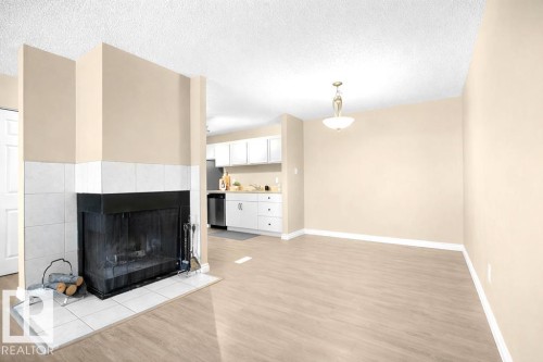9345 172 Street, Edmonton, AB - Indoor Photo Showing Living Room With Fireplace