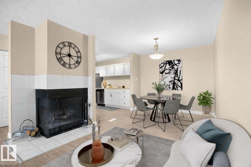 Virtually Staged by FabDecorz. - 9345 172 Street, Edmonton, AB - Indoor Photo Showing Living Room With Fireplace