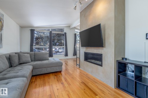 6511 103 Avenue, Edmonton, AB - Indoor Photo Showing Living Room With Fireplace