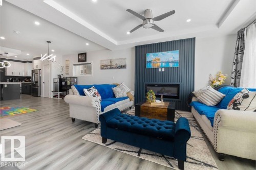 16 Raspberry Road, St. Albert, AB - Indoor Photo Showing Living Room With Fireplace