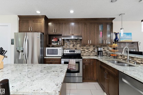 8148 77 Avenue, Edmonton, AB - Indoor Photo Showing Kitchen With Double Sink With Upgraded Kitchen