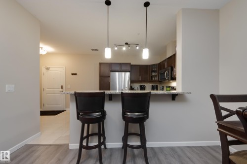 317 6083 Maynard Way, Edmonton, AB - Indoor Photo Showing Kitchen With Upgraded Kitchen