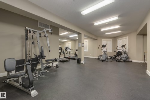 317 6083 Maynard Way, Edmonton, AB - Indoor Photo Showing Gym Room