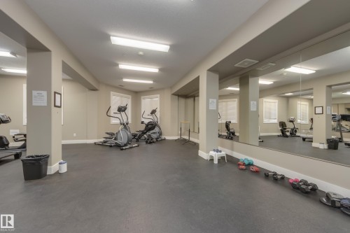 317 6083 Maynard Way, Edmonton, AB - Indoor Photo Showing Gym Room