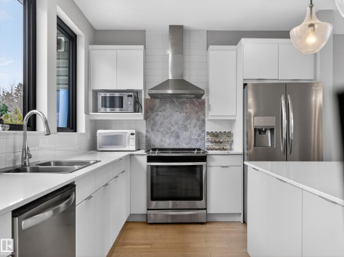 5 1304 Rutherford Road, Edmonton, AB - Indoor Photo Showing Kitchen With Double Sink With Upgraded Kitchen