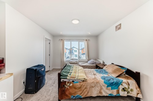 Window facing the front street area. - 12435 47 Street Nw, Edmonton, AB - Indoor Photo Showing Bedroom