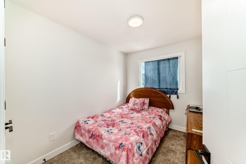 Bedroom Three. - 12435 47 Street Nw, Edmonton, AB - Indoor Photo Showing Bedroom
