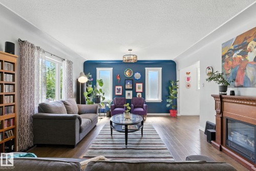 11204 61 Street, Edmonton, AB - Indoor Photo Showing Living Room With Fireplace