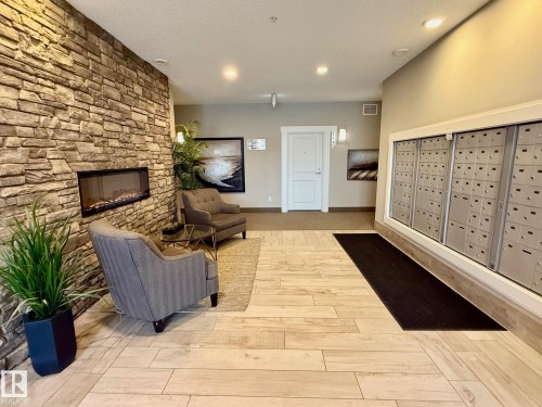 108 12804 140 Avenue, Edmonton, AB - Indoor With Fireplace