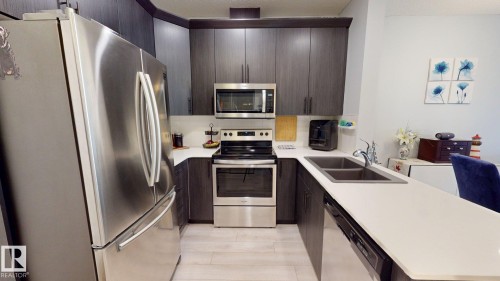 108 12804 140 Avenue, Edmonton, AB - Indoor Photo Showing Kitchen With Double Sink With Upgraded Kitchen