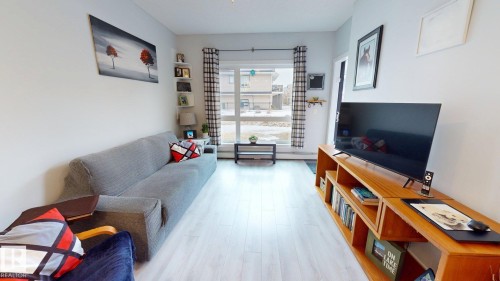 108 12804 140 Avenue, Edmonton, AB - Indoor Photo Showing Living Room