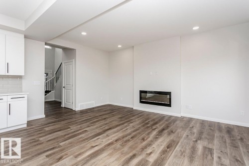 7624 Kimiwan Crescent, Edmonton, AB - Indoor With Fireplace