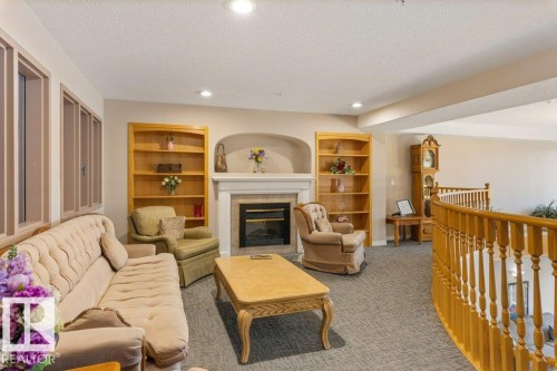238 2741 55 Street, Edmonton, AB - Indoor With Fireplace