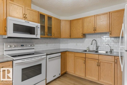 238 2741 55 Street, Edmonton, AB - Indoor Photo Showing Kitchen With Double Sink