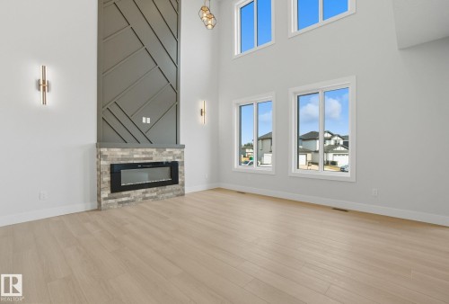 4 Harley Way, Spruce Grove, AB - Indoor Photo Showing Living Room With Fireplace