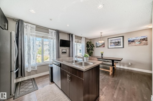 63 3625 144 Avenue Nw, Edmonton, AB - Indoor Photo Showing Kitchen With Double Sink